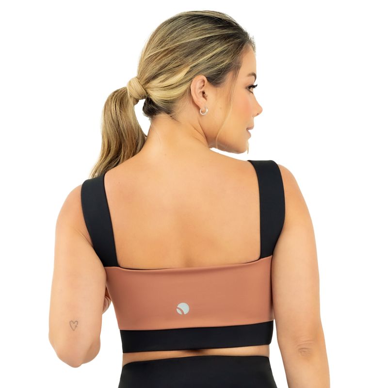 Top deportivo con soporte fijo y cargaderas anchas ideal para entrenamiento y uso diario